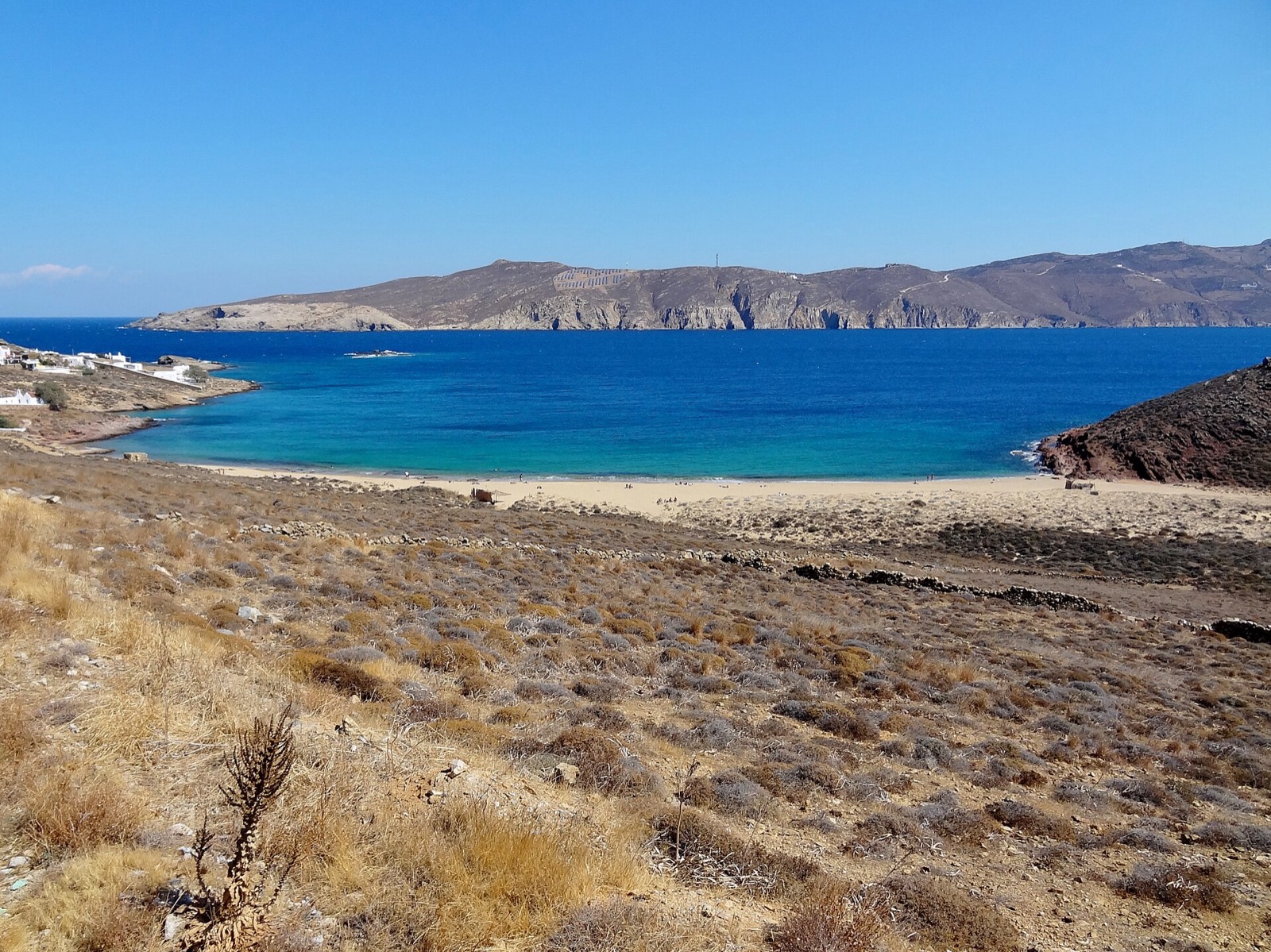 The quiet sandy bay of Agios Sostis on the north coast