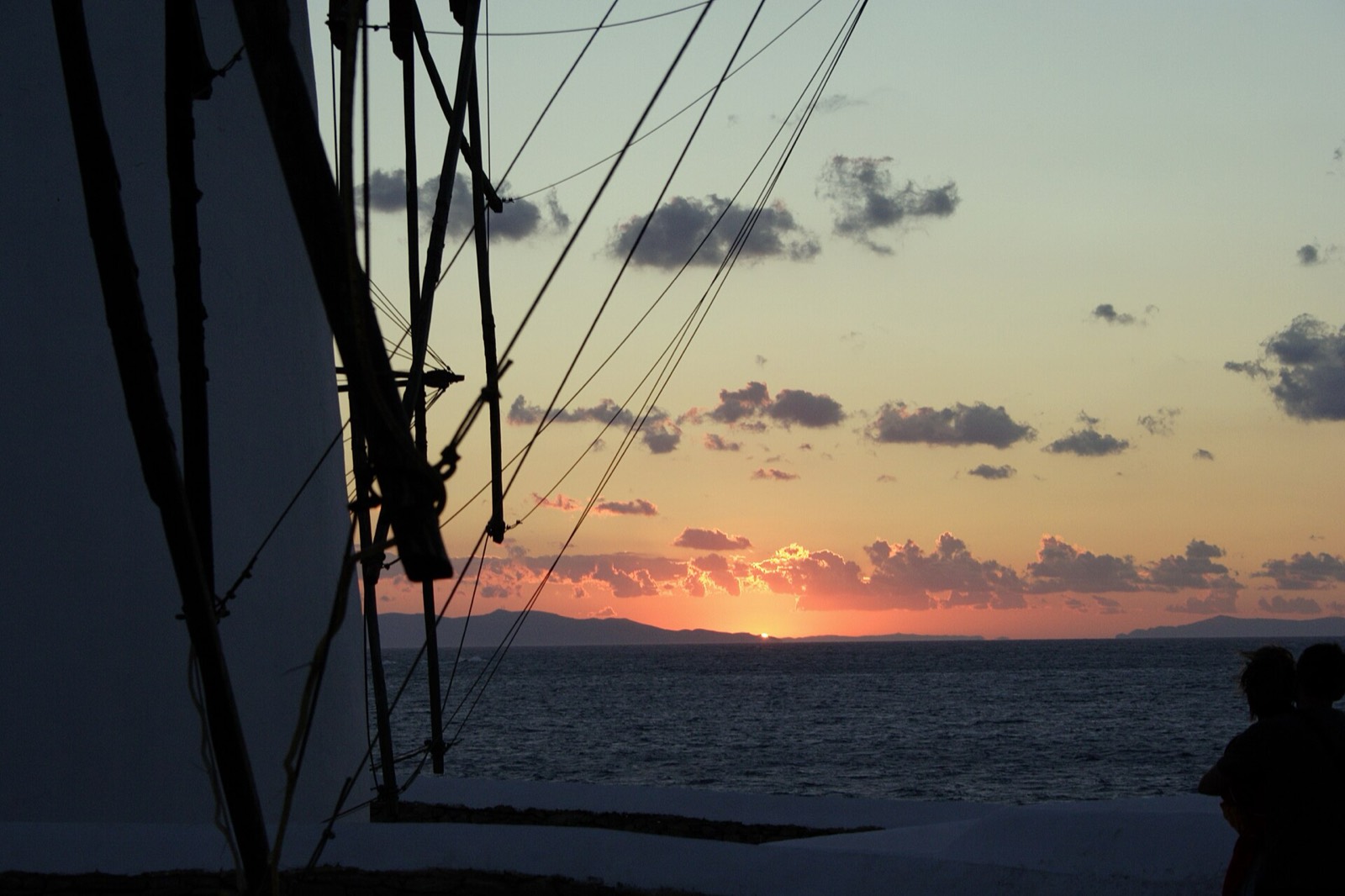 Sunset framed by the sails of a Kato Mili windmill